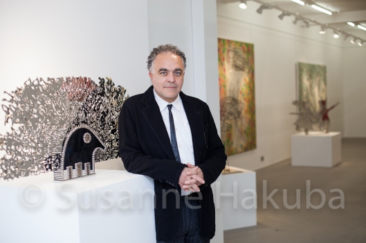 Nadim Karam at his exhibition "Shooting the cloud" at Ayyam Gallery, London.